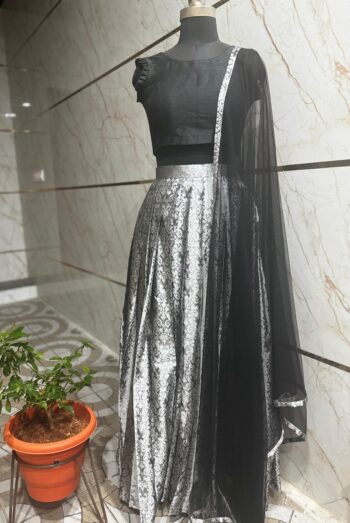 Silver Lehenga paired with a Black Dupatta