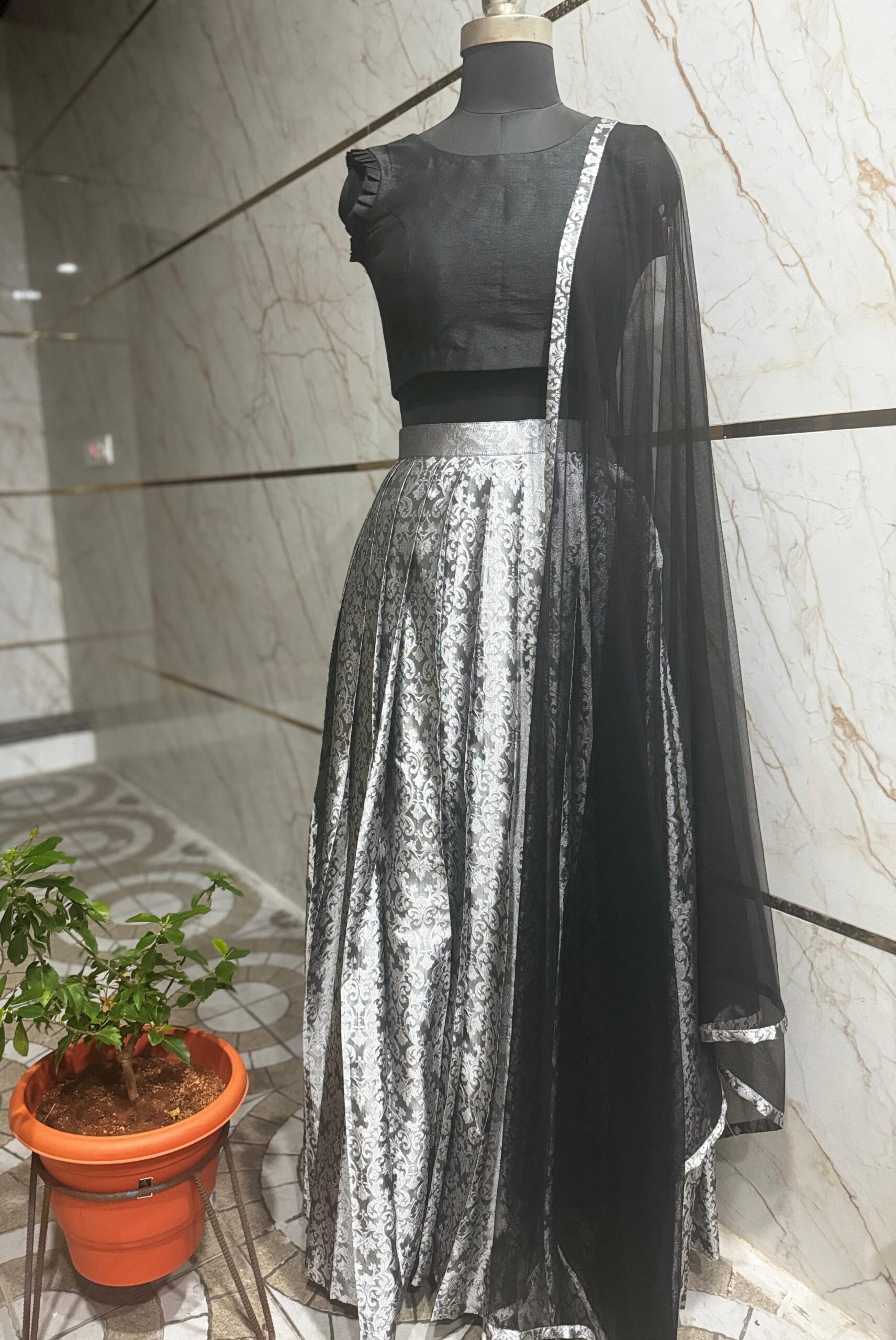 WhatsApp Image 2024-09-30 at 12.44.27 PM Silver Lehenga paired with a Black Dupatta